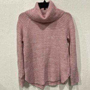 It’s Our Time salmon colored knitted turtleneck.